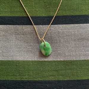 Jade and 14k gold charm
